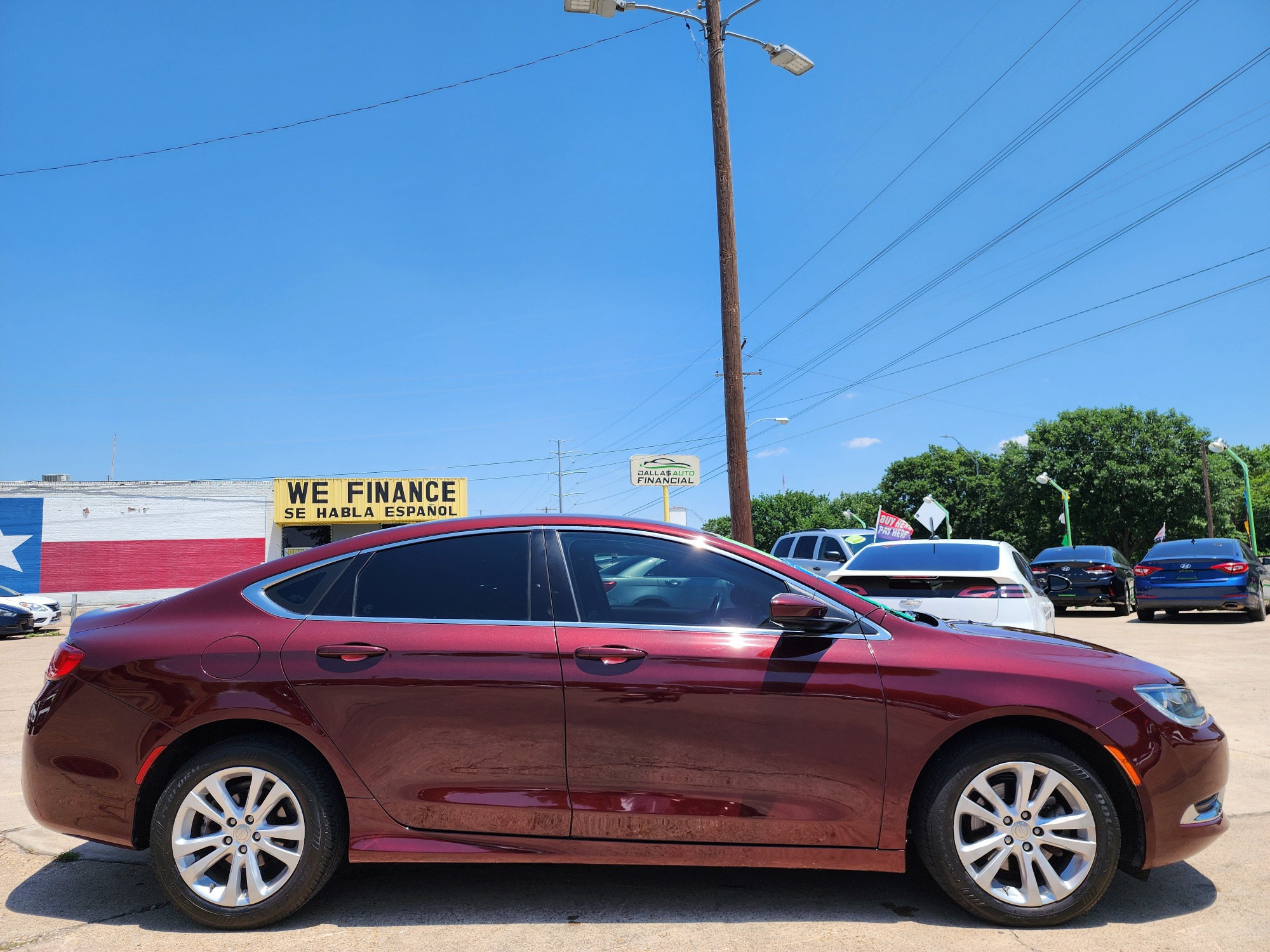 2015 Chrysler 200 Limited (1C3CCCABXFN) with an 2.4L L4 DOHC 16V engine, 9-Speed Automatic transmission, located at 2660 S.Garland Avenue, Garland, TX, 75041, (469) 298-3118, 32.885551, -96.655602 - Welcome to DallasAutos4Less, one of the Premier BUY HERE PAY HERE Dealers in the North Dallas Area. We specialize in financing to people with NO CREDIT or BAD CREDIT. We need proof of income, proof of residence, and a ID. Come buy your new car from us today!! This is a very well cared for 2015 Ch - Photo #2